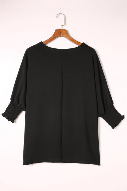 Black Smocked Wrist Shift Top