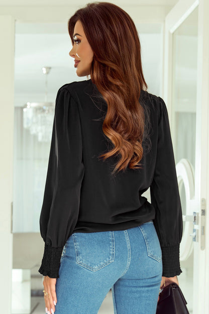 Black Solid Surplice Neck Shirred Cuffs Draped Blouse