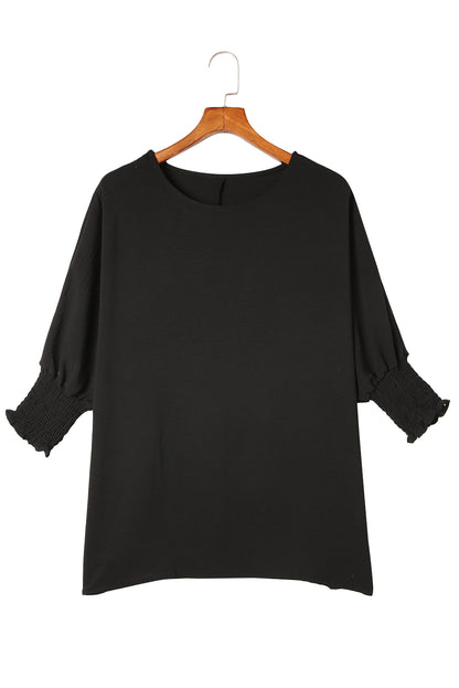 Black Smocked Wrist Shift Top