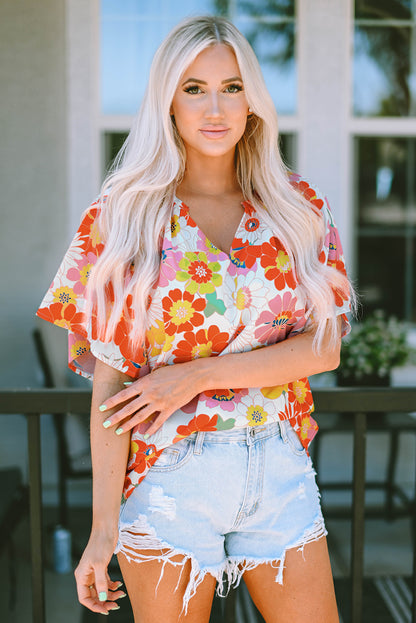 Orange Abstract Print V Neck Half Sleeve Blouse